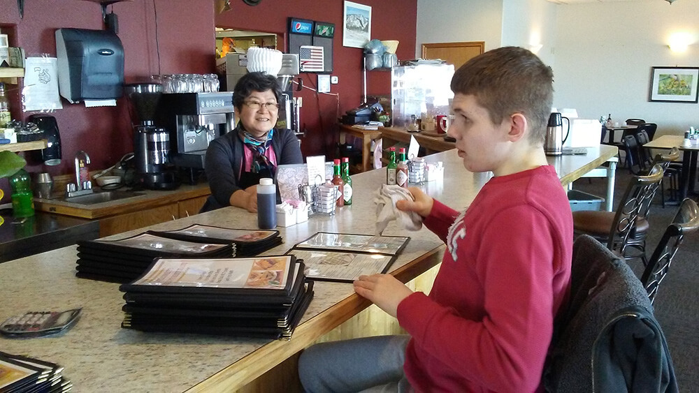 student at restaurant