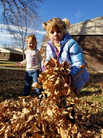 kids playing in leafs